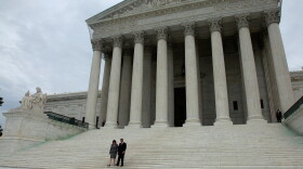 Chief Justice John Roberts (R) and Associate Justice Sonia Sotomayor walk down the steps of the U.S. Supreme Court building after her investiture ceremony on September 8, 2009 in Washington, DC. 