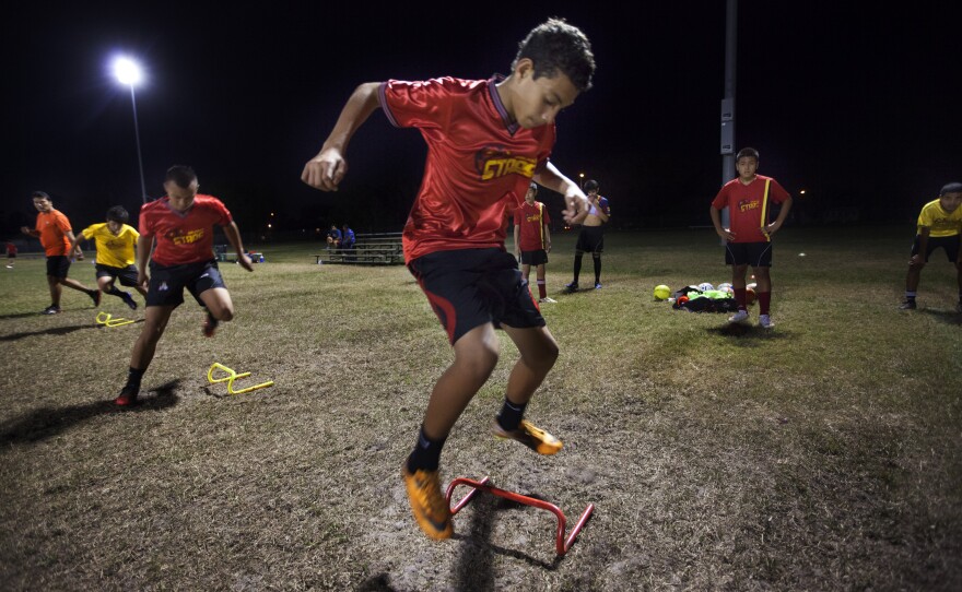 Louis Jimenez, 14, attends soccer practice for his team, the Orlando Stars, at the Archie Gordon Memorial Park in Kissimmee.