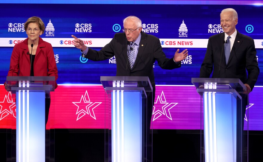 From left: Presidential candidates Sen. Elizabeth Warren, D-Mass., Sen. Bernie Sanders, I-Vt., and former Vice President Joe Biden participate in the Democratic debate.