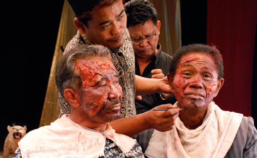 Anwar Congo getting made up. In a mind-bending twist, death-squad leaders dramatize their brutal deeds in the style of the American westerns, musicals and gangster movies they love — and play both themselves and their victims.