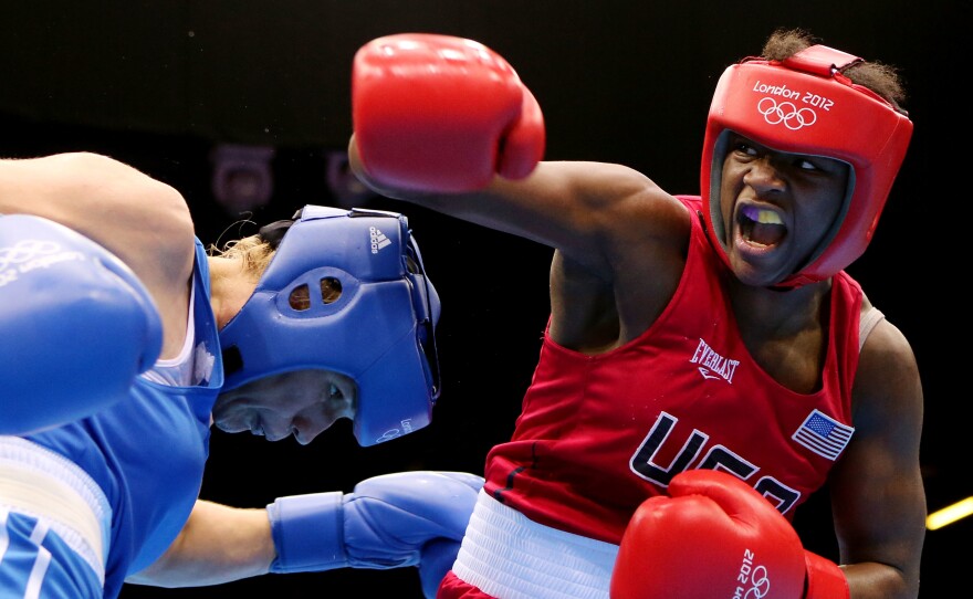 Claressa (right) exchanges punches with Nadezda Torlopova of Russia during the Women's Middle Boxing final bout during the London 2012 Olympic Games.
