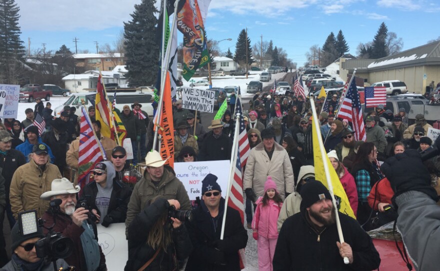Protesters in Burns, Ore., march toward the home of Dwight Hammond Jr., a local rancher convicted of arson on federal land. The Jan. 2 protest was peaceful, but ended with a group of militiamen occupying the Malheur National Wildlife Refuge.