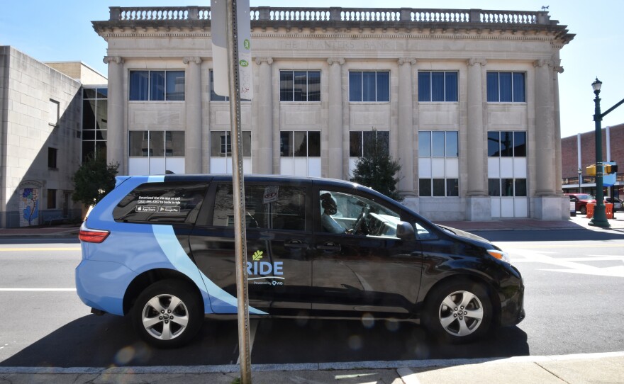 A RIDE minivan parks across the street from City Hall in Wilson, N.C.