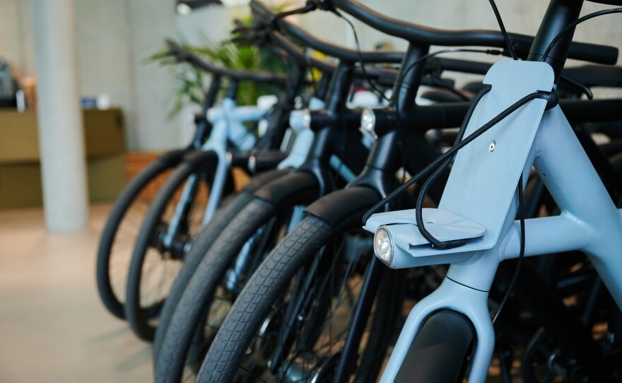 Bicycles from the VanMoof company stand in the store at Rosa-Luxemburg-Platz in Berlin, Germany, in March 2022.