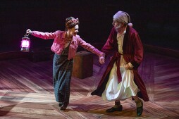 Cathryn Wake as Ghost of Christmas Present and Robert Joy as Ebenezer Scrooge