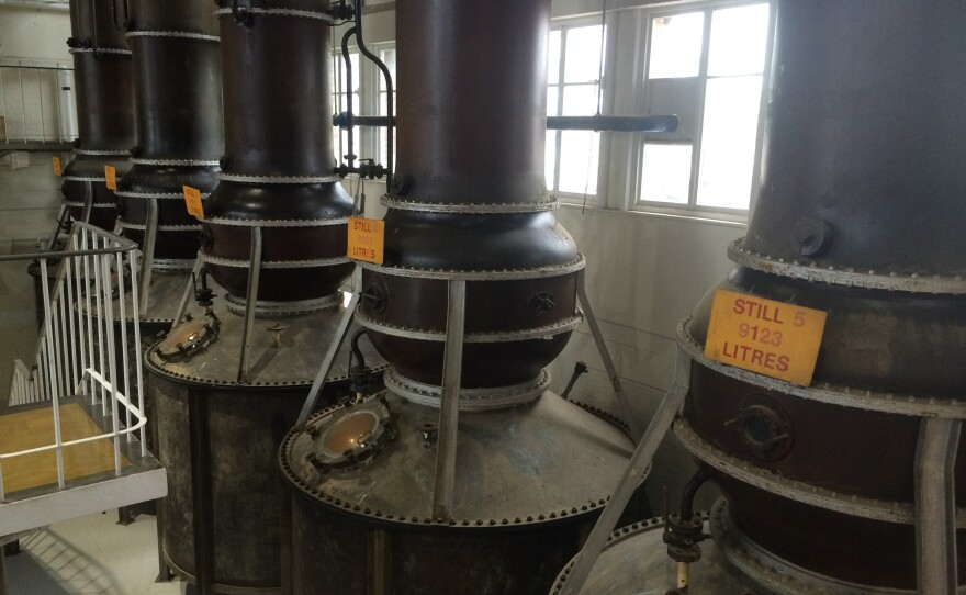 At Beefeater in London, large copper stills are used to distill the alcohol that will eventually become gin.