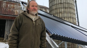 Rick Moore, a dairy farmer in Canton, N.Y., has a solar thermal array to heat water he uses to spray down milking equipment.