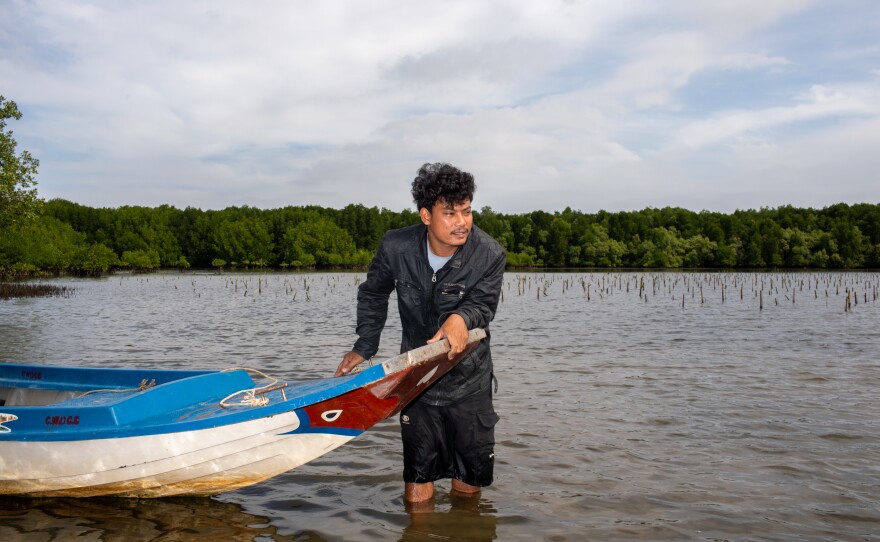 Khiev Chien helps manage his local community fishery, which protects local mangrove forests and helps with replanting efforts. Mangroves are excellent at trapping carbon, which would otherwise contribute to global warming, and Khiev is proud that the work he does helps address climate change.