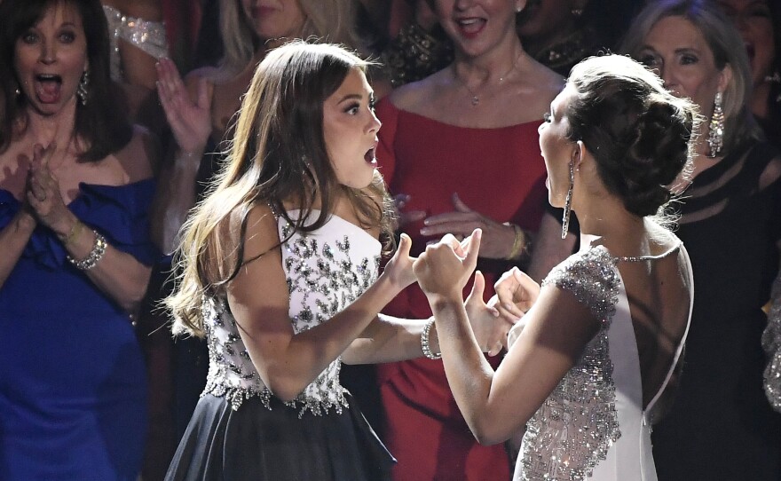 Miss Alaska Emma Broyles, says she was shocked to hear her name announced as the winner of the Miss America competition. At right is the runner-up, Miss Alabama Lauren Bradford.