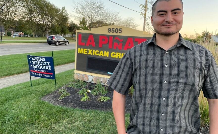 Javier Mata was surprised when a school board campaign sign prompted complaints from some customers, who threatened to boycott.