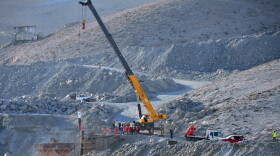 A rescue team tests the capsule through which the 33 miners trapped in the San Jose mine will be brought to the surface near Copiapo, Chile. Drillers passed the halfway mark Thursday in their most advanced evacuation shaft toward the men who have been trapped deep underground since Aug. 5. 