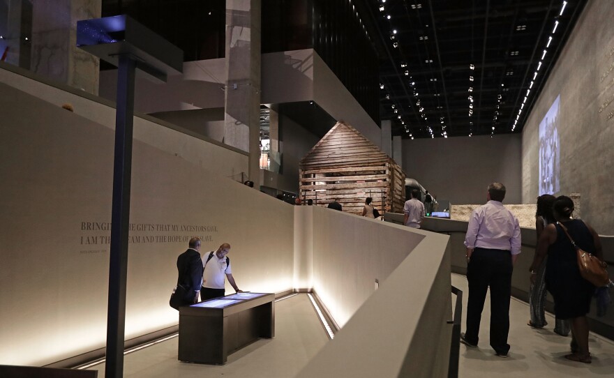 A series of long ramps guide visitors through the exhibits in the lower levels of the Smithsonian's National Museum of African American History and Culture.