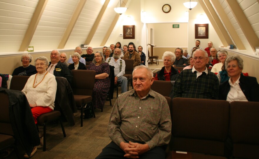 Inside Chapel of the Interlude's tiny sanctuary, members gather for Sunday worship.