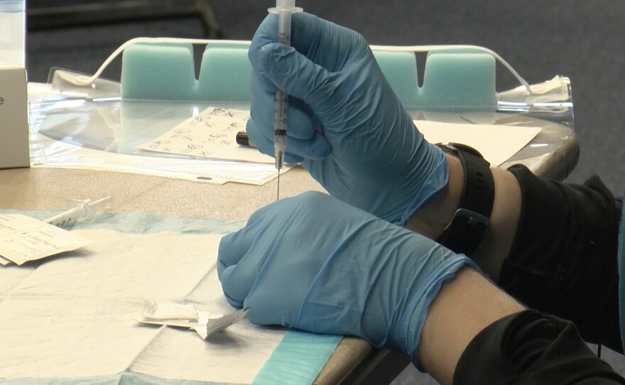 A COVID-19 vaccine is drawn at the vaccination site at CSU San Marcos. Feb. 22, 2021.