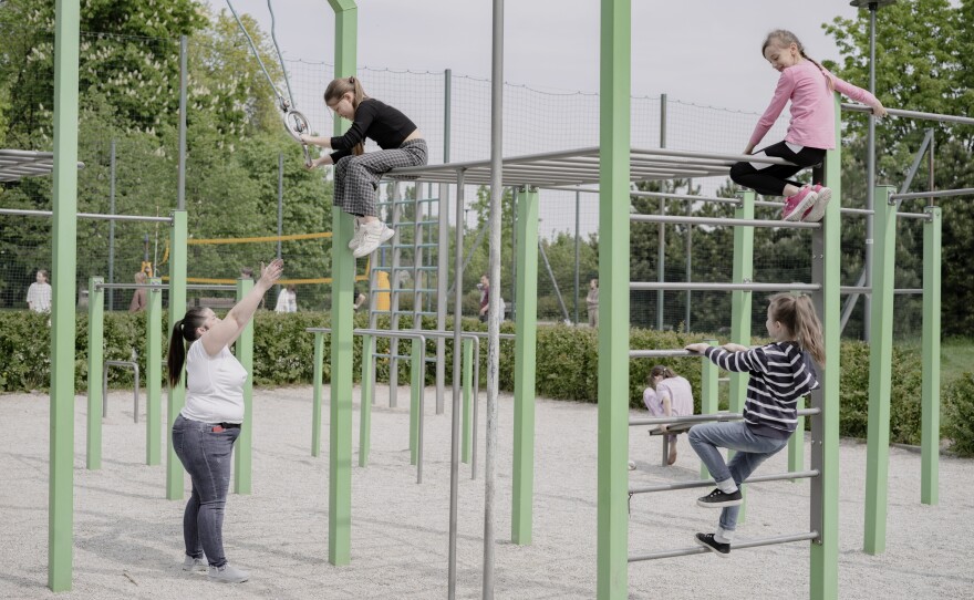 Ukrainian children play on the playground near Poland's Warsaw Ukrainian School.