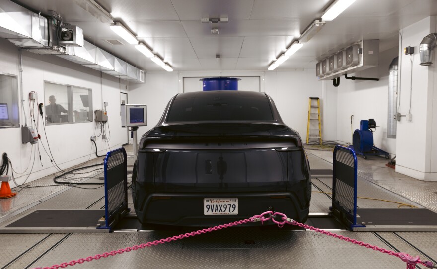A test vehicle is positioned on a chassis dynamometer. "For lack of a better term, I guess it's kind of like a treadmill for a car," says Megan McKernan.