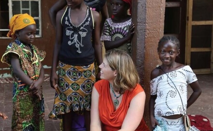 Erica Ollmann Saphire, a professor with the La Jolla Institute for Immunology, talks to children in Africa on a recent trip to the region to study Ebola in this undated photo.