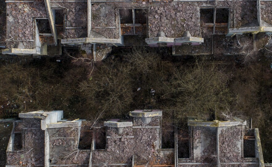 A view of a retirement home devastated during the Bosnian war in the capital Sarajevo, Bosnia, Friday, March 4, 2022.