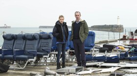 Elise Wassermann (Clémence Poésy) and Karl Roebuck (Stephen Dillane).
