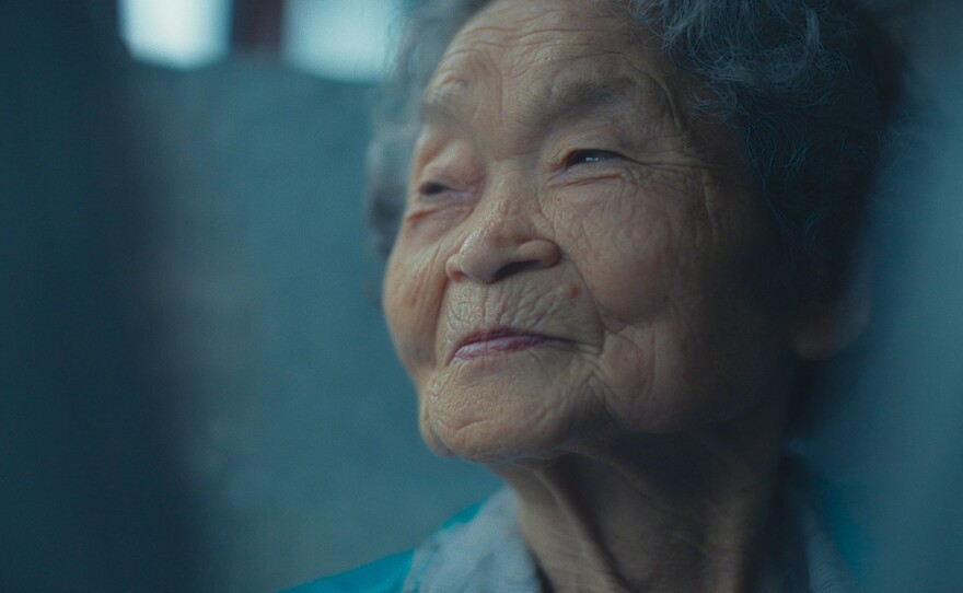 Kiyomi Iguro on bus - Kiyomi Iguro (1929-2023) was 19 years old when the bomb fell on Nagasaki.