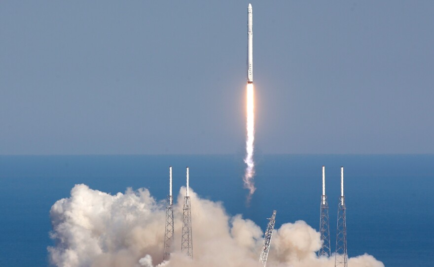 The SpaceX Falcon 9 rocket lifts off from launch complex 40 at the Kennedy Space Center in Cape Canaveral, Fla., on Friday.
