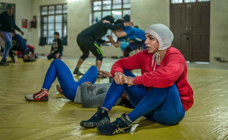 Sakshi Malik takes a break in the gym where she trains.