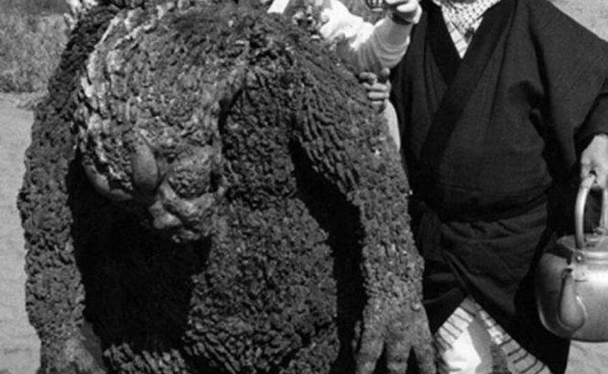 Suit actor Harao Nakajima taking a tea break from playing Godzilla.