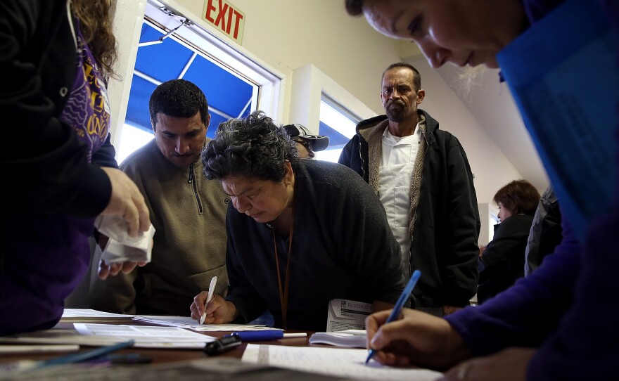 Hundreds in California rushed to get health insurance just before the deadline.