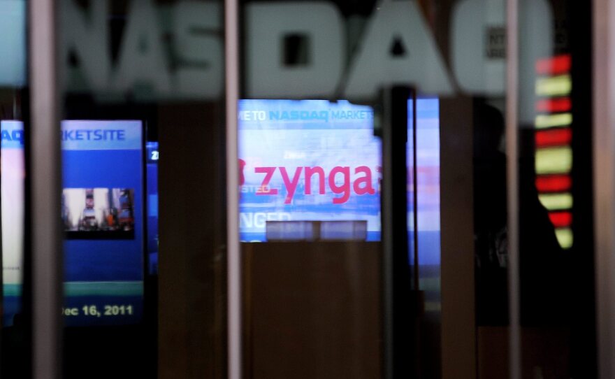 The display at the NASDAQ building promotes the IPO of online game developer Zynga.