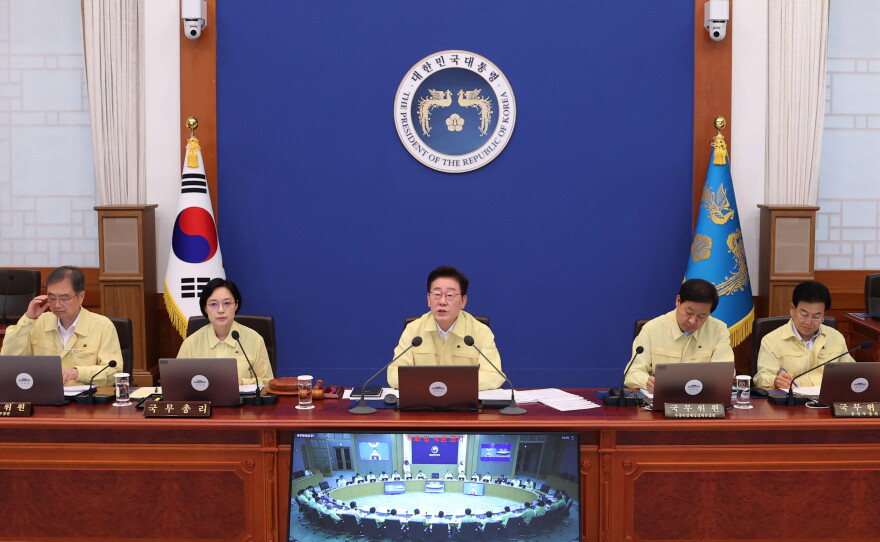South Korean President Lee Jae Myung, center, speaks during a cabinet meeting at the presidential office in Seoul, South Korea, Tuesday, Aug. 18, 2026.
