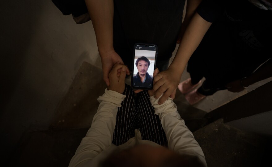 Marooned in Thailand, Gao's family video-calls him thousands of miles away in the Netherlands.