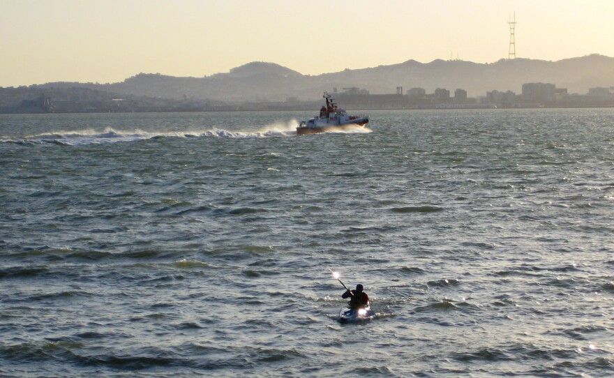 Stephen Linaweaver kayaks home across the San Francisco Bay.