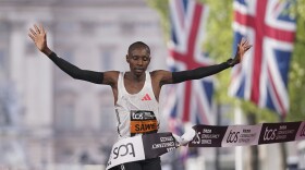 Sabastian Sawe of Kenya crosses the line to win the men's race at the London Marathon, April 27, 2025