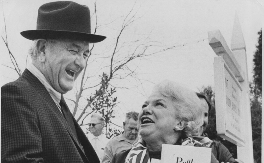 1970, Liz Carpenter and LBJ share a laugh while promoting her bestselling White House memoir.