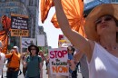 Demonstrators march to the White House during a May Day protest in Washington, D.C., on May 1, 2025.