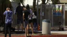 Students and parents wait in line at COVID-18 testing site held at Eastlake High school on August 3, 2021. 