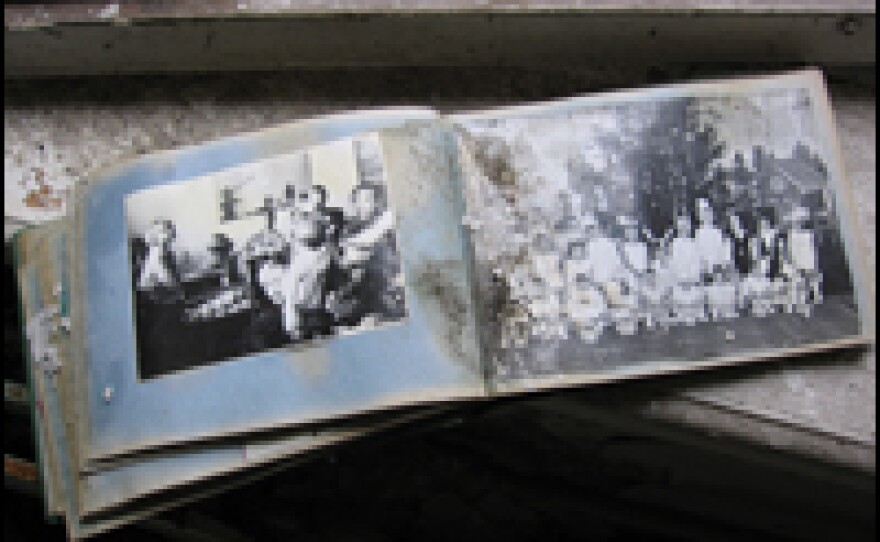 A photo album left behind in a Pripyat building.