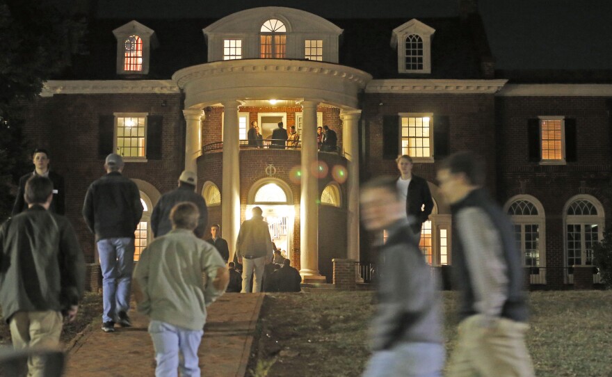 University of Virginia students walk to fraternities at the start of rush week. Sorority women are always invited to Boys' Bid Night, but this year national sororities have ordered women to stay clear.