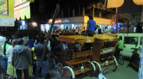 The street blocked in Chilapa, Guerrero, Mexico by a Christmas parade. 