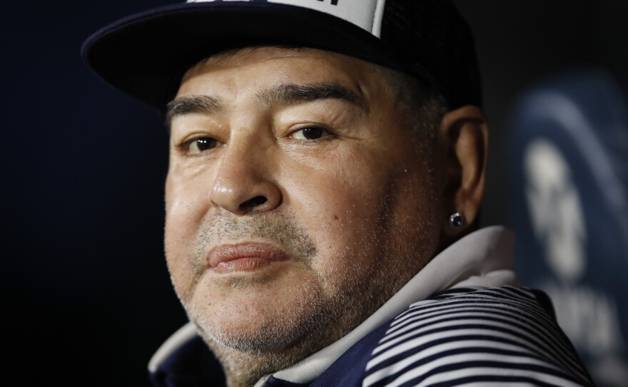 Diego Maradona, coach of Gimnasia y Esgrima, sits on the bench prior to Argentina's soccer league match against Boca Juniors at La Bombonera stadium in Buenos Aires, Argentina, in March.