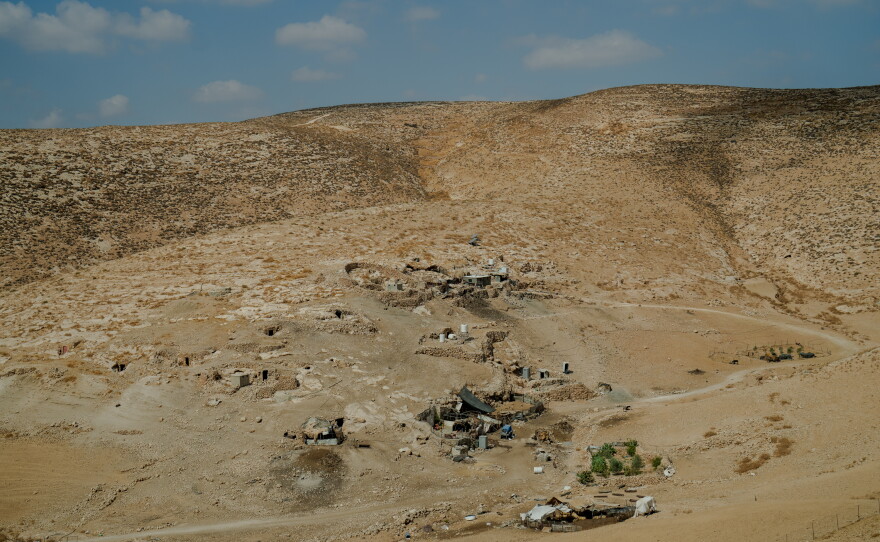 A remote Palestinian pastoral hamlet with stone dwellings and shelters nestled into the arid hills of Masafer Yatta, in the occupied West Bank, on Sept. 24, 2026.