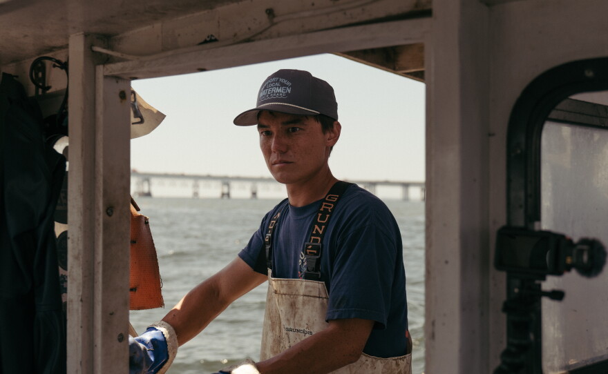 Luke McFadden captains his crab boat, the F.V. Southern Girl, near Sandy Point State Park, in Annapolis, Maryland. McFadden, 30, works with a team to haul up scores of crab traps — or "crab pots," as they're called,