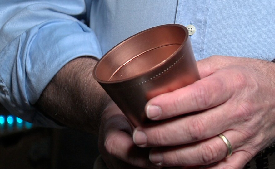 The plastic "copper" cup.