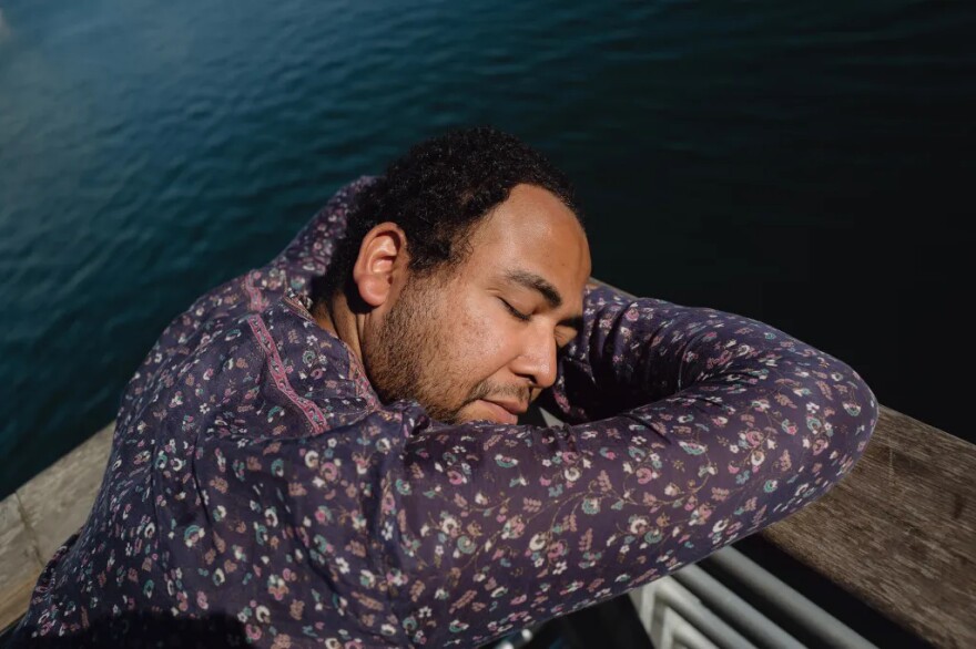 Will Rose finds moments of stillness by the waterfront in San Pedro on Oct. 16, 2025. He said he has been struggling with a constant noise in his mind about who he should be, and it’s in these moments by the water that he tries to find peace.