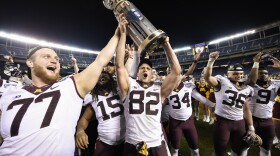 Minnesota players celebrate after defeating Washington State 17-12 in the Holiday Bowl NCAA college football game at Qualcomm Stadium, Dec. 27, 2016.