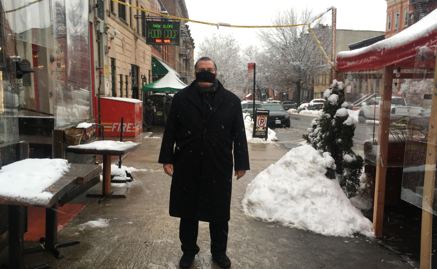 Owner Donald Minerva outside Scottadito Osteria Toscana restaurant in Brooklyn, N.Y., which has been closed for indoor dining for two months. The restaurant is reopening at reduced capacity on Valentine's weekend.