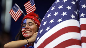 A spectator watches warm-ups before an international friendly soccer match between South Korea and the United States in Harrison, N.J, May 30, 2015.