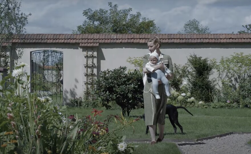 Sandra Hüller plays a mother who lives next door to Auschwitz in <em>The Zone of Interest.</em>