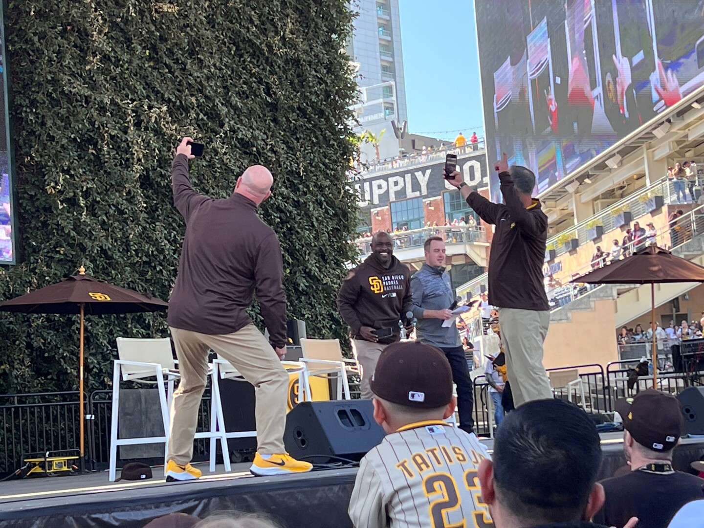 Radio announcer Tony Gwynn Jr. smiles during an on stage segment at Padres Fanfest.