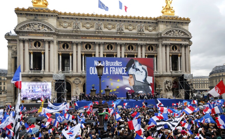 Hundreds of supporters of France's far-right National Front political party attend the party's annual May Day rally in front of the Paris Opera on Thursday.
